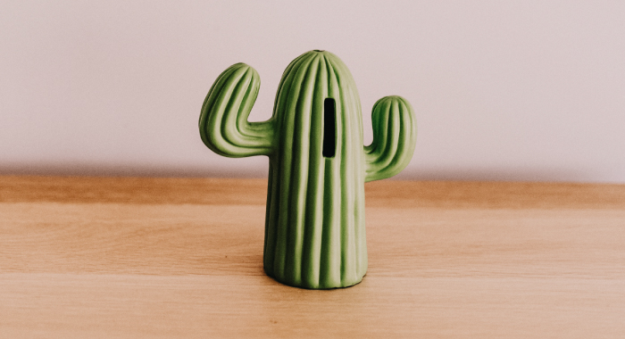 piggy bank in the shape of a cactus
