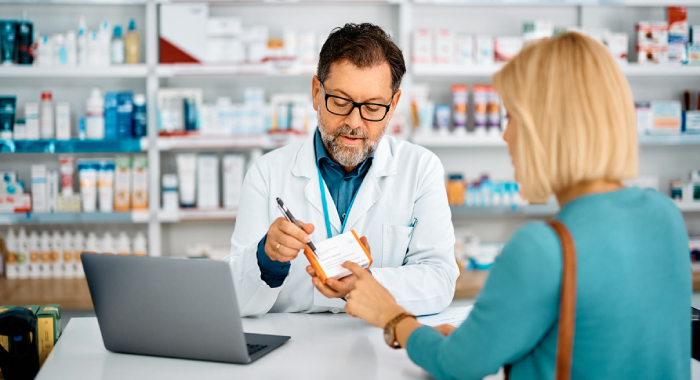 pharmacist writing a prescription